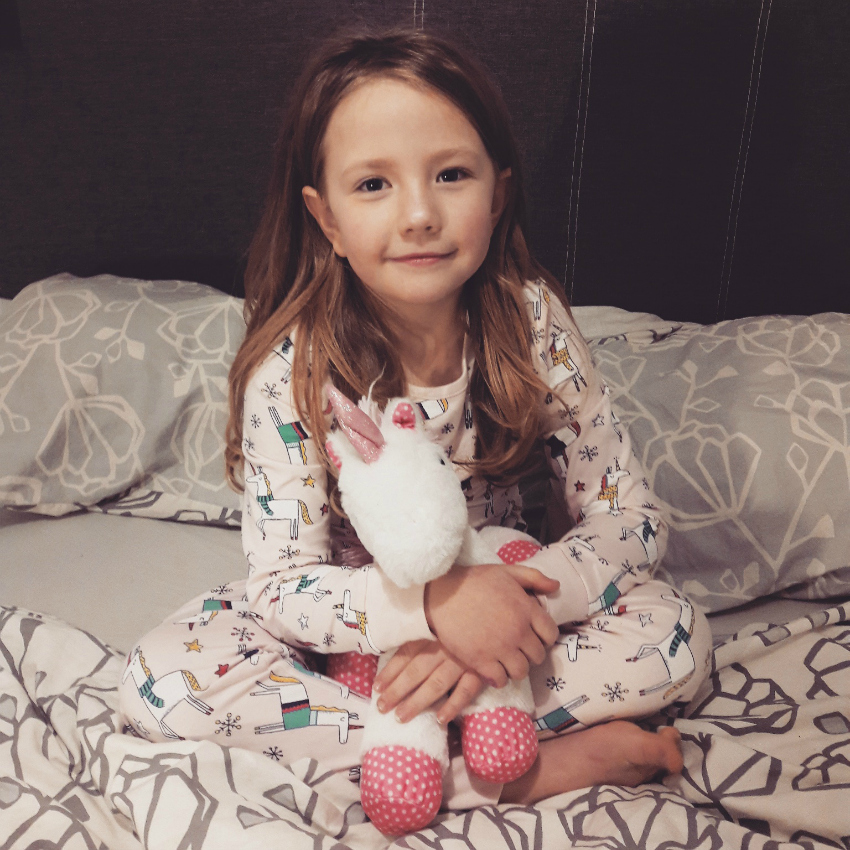 Amy loving her unicorn pyjamas